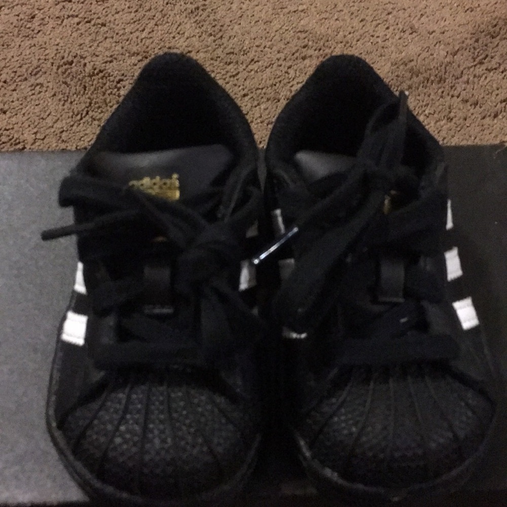 Brand new black&white adidas. Toddler size 4